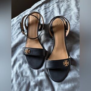 Tory Burch Black Sandals with Gold Emblem